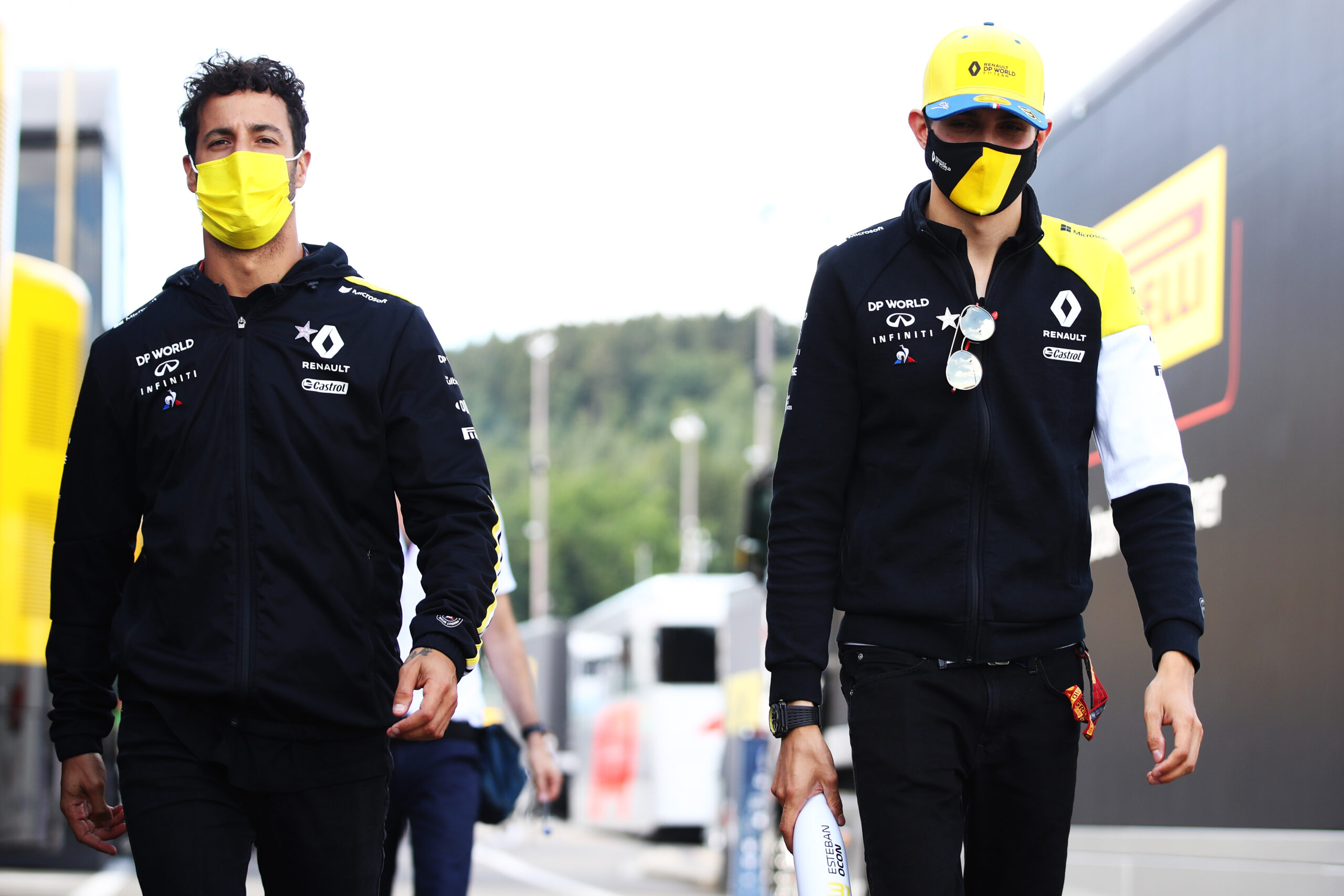 SPA, BELGIUM - AUGUST 27: Daniel Ricciardo of Australia and Renault Sport F1 and Esteban Ocon of France and Renault Sport F1 walk in the paddock during previews ahead of the F1 Grand Prix of Belgium at Circuit de Spa-Francorchamps on August 27, 2020 in Spa, Belgium. (Photo by Mark Thompson/Getty Images)