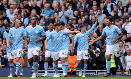 Jogadores comemoram gol do Manchester City (Foto: George Wood/Getty Images)