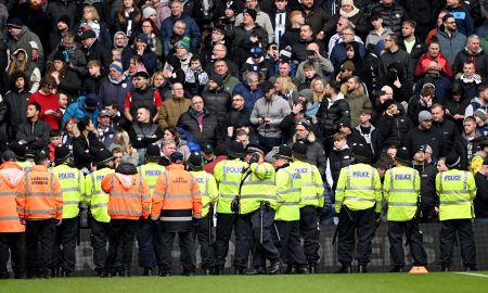 Policiamento fez barreira de proteção (Foto: Shaun Botterill/Getty Images)