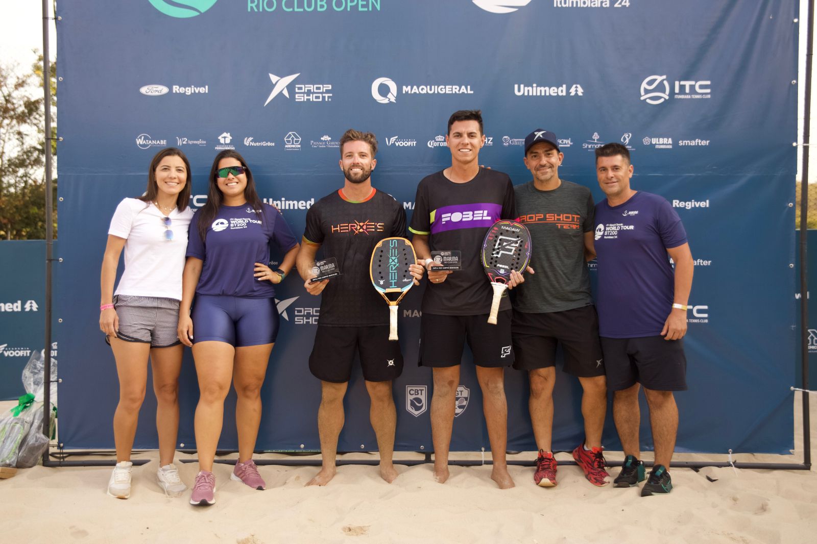 Gustavo Russo de preto e roxo ao centro (Foto: @agencia.allmarketing)