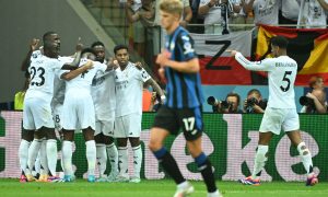 Real Madrid's players celebrate scoring during the UEFA Super Cup football match between Real Madrid and Atalanta BC in Warsaw, on August 14, 2024. (Photo by Sergei GAPON / AFP) (Photo by SERGEI GAPON/AFP via Getty Images)