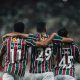 O trio de destaque da partida comemorando o gol da vitoria LUCAS MERÇON / FLUMINENSE F.C.