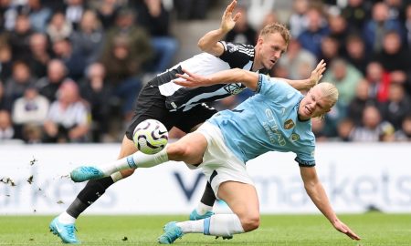 Haaland e Burn. (Foto: Matt McNulty/Getty Images)