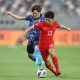 Jin Jingdao foi um dos jogadores com passagem pela seleção que foi banido. (Foto: Mohamed Farag/Getty Images)